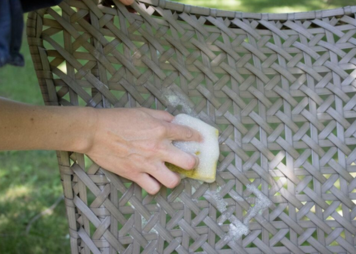 Gently clean stains or dirty areas on the rattan chair
