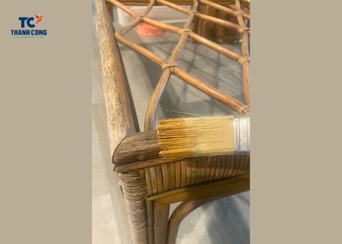 Use a paint brush to apply a new coat of paint to the wicker furniture