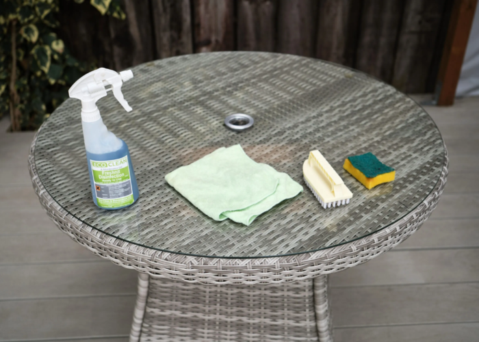Clean outdoor synthetic wicker table, begin by brushing or vacuuming away loose dirt, dust, and debris from the surface of the outdoor wicker table