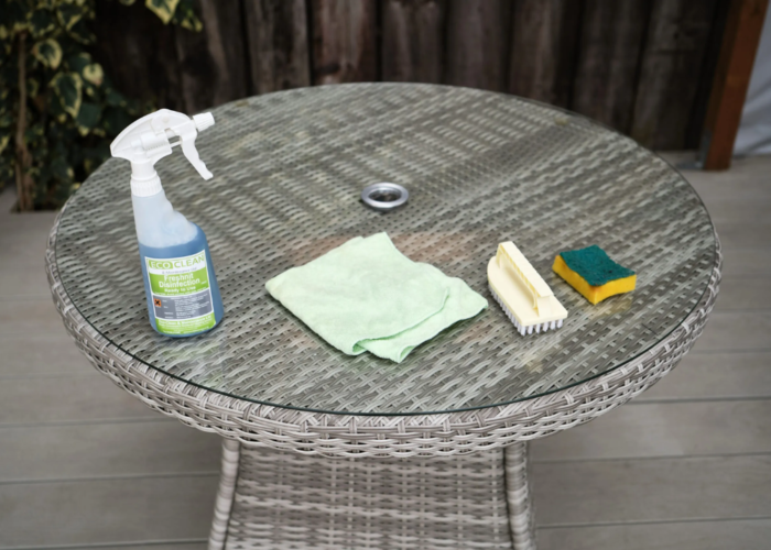 Begin by brushing or vacuuming away loose dirt, dust, and debris from the surface of the outdoor wicker table Clean outdoor synthetic wicker table, begin by brushing or vacuuming away loose dirt, dust, and debris from the surface of the outdoor wicker table