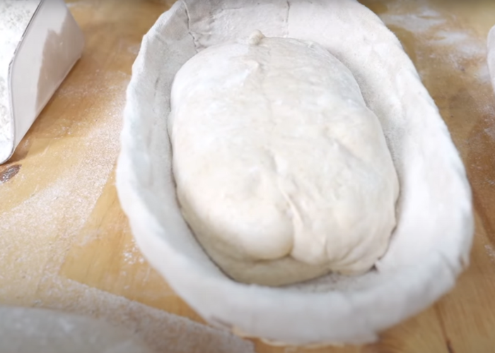 Shape the dough into a round or oval shape