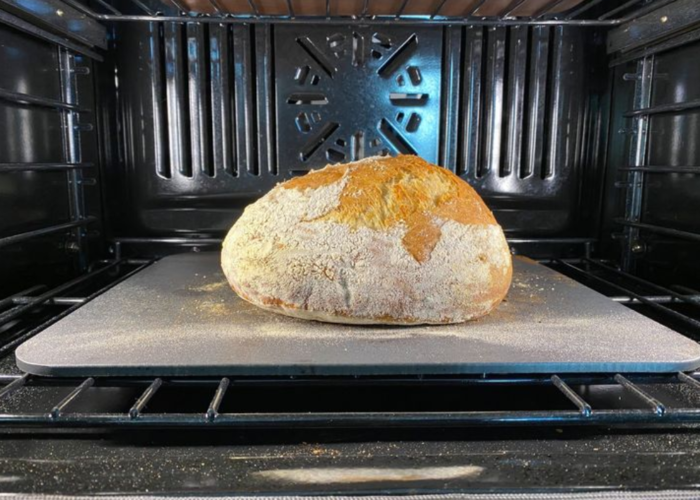 Bake the bread in an oven preheated to around 230 degrees Celsius for 20-30 minutes