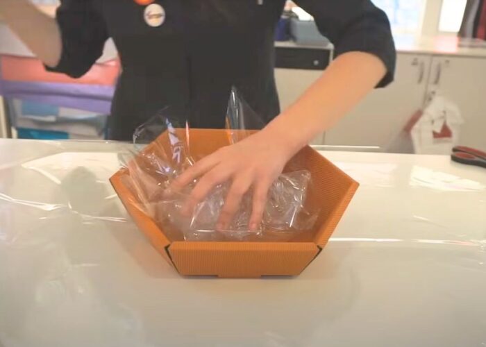 How to wrap a gift basket with cellophane How to wrap a gift basket with cellophane