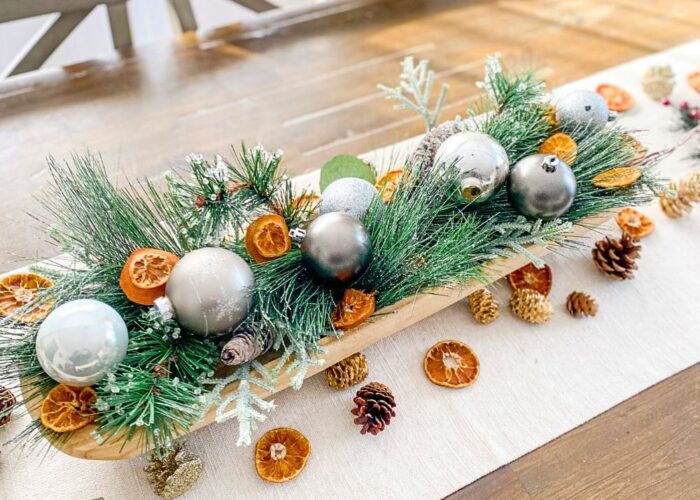 Miniature winter wonderland by arranging faux evergreen trees