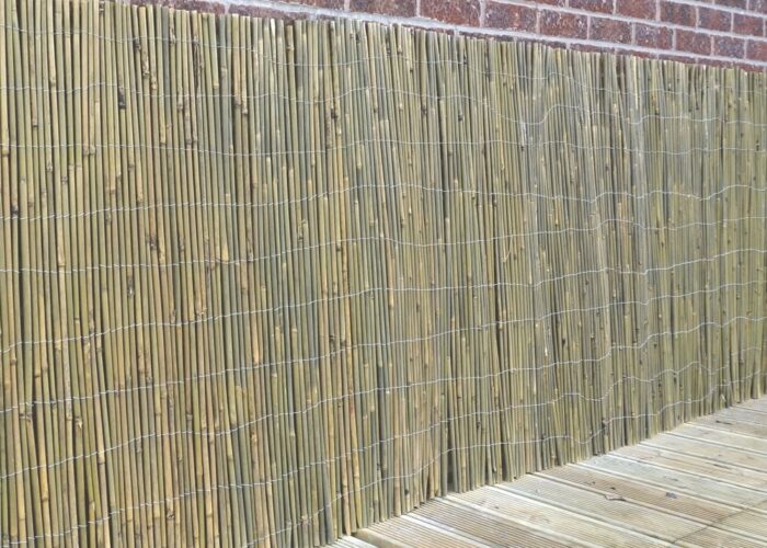 How to attach bamboo screening to a brick wall