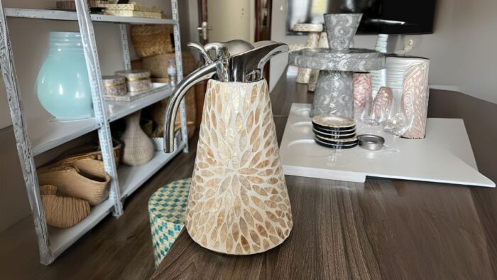 Wholesale handcrafted mother of pearl bottle for luxury home decor retailers