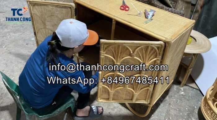 Workers are checking the rattan cabinets