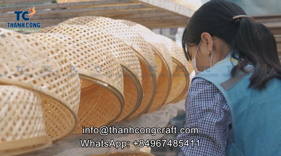 Workers check the quality of bamboo products