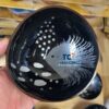 Handcrafted black lacquer coconut bowl with silver fish, popular island gift shop product