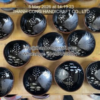 Wholesale handcrafted coconut bowls with marine life patterns, bulk production Vietnam